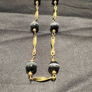 Black cats eye and gold necklace